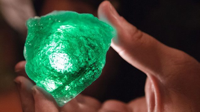 Large emerald crystal. Visiting the mine office in the village of Coscuez in the evening.